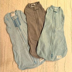 Three Woombies Swaddles